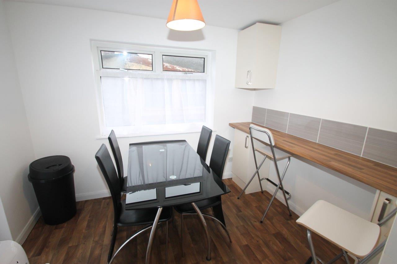 Shared dining area with breakfast bar