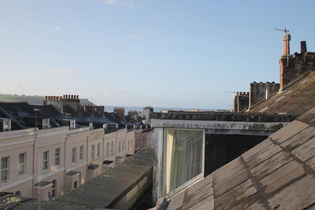 view from bedroom window showing the sea