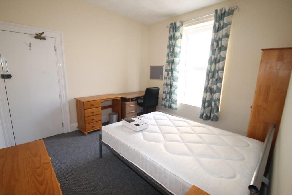 Fourth bedroom with double bed, two desk with drawers, two door wardrobe and chest of drawers