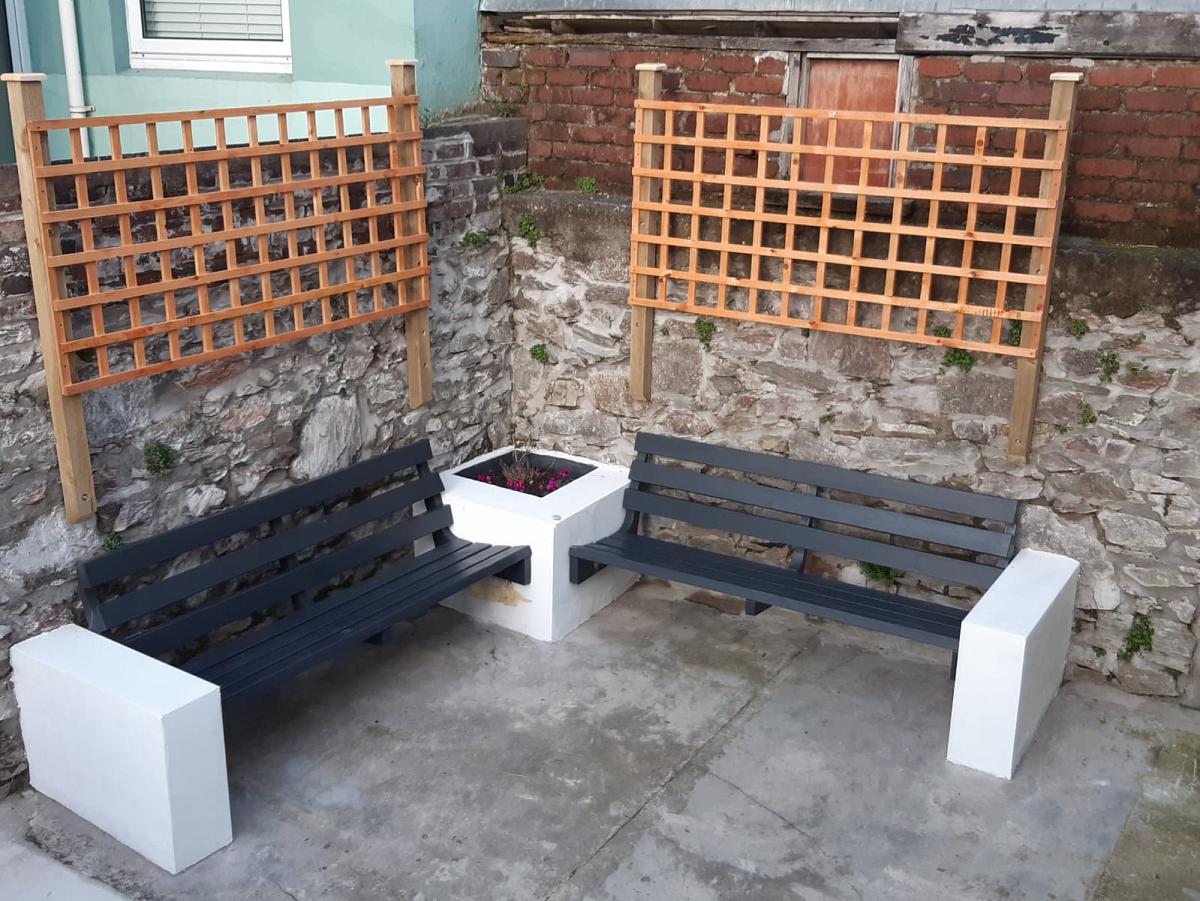 Back patio of property with outdoor furniture