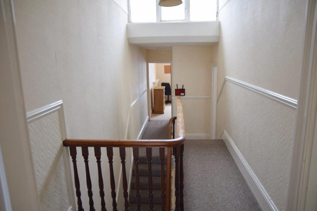 Upstairs hallway leading to student rooms