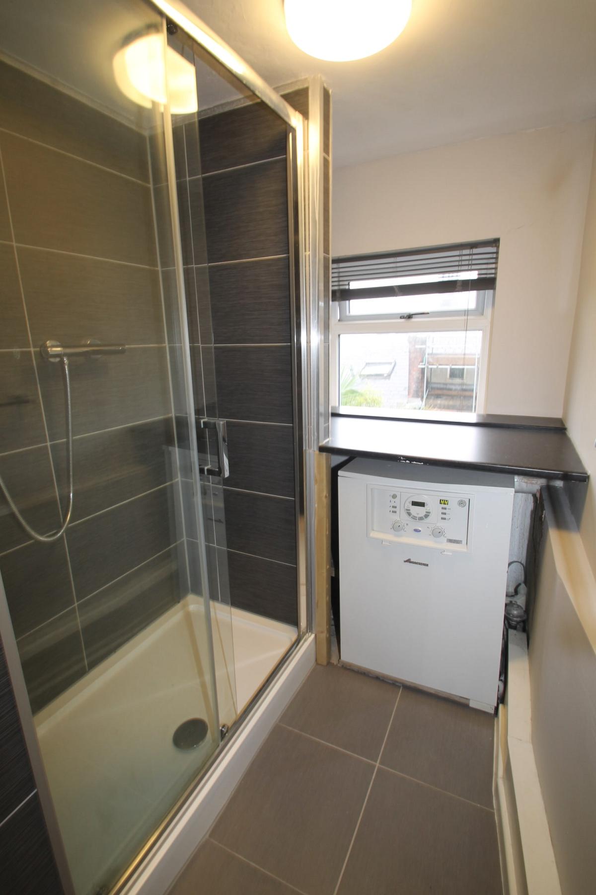 Shared shower room with boiler