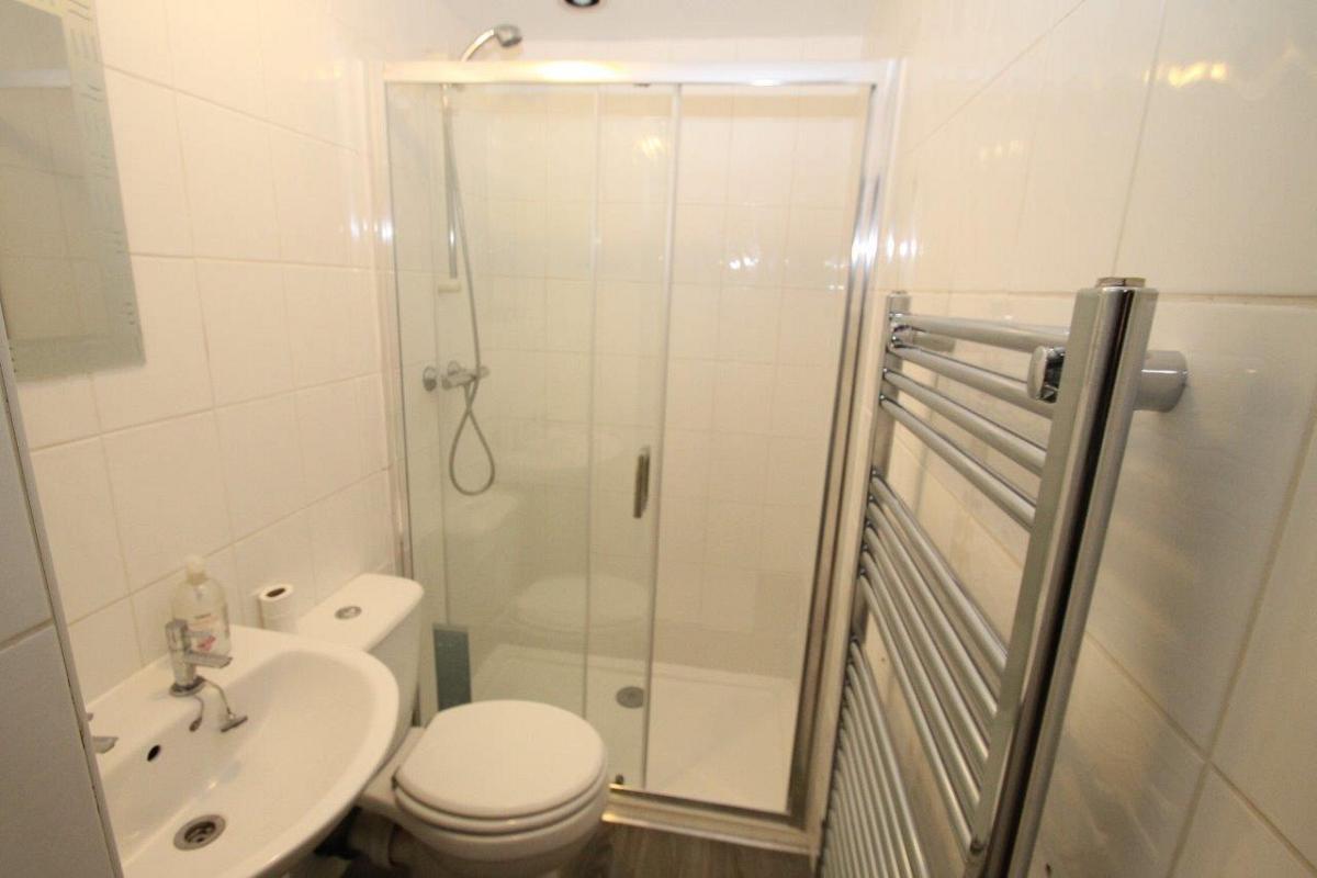 Shared bathroom with shower