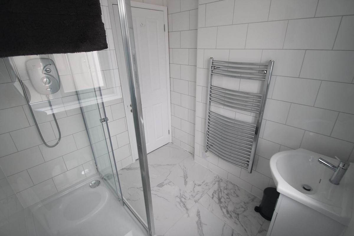 Shared bathroom with shower