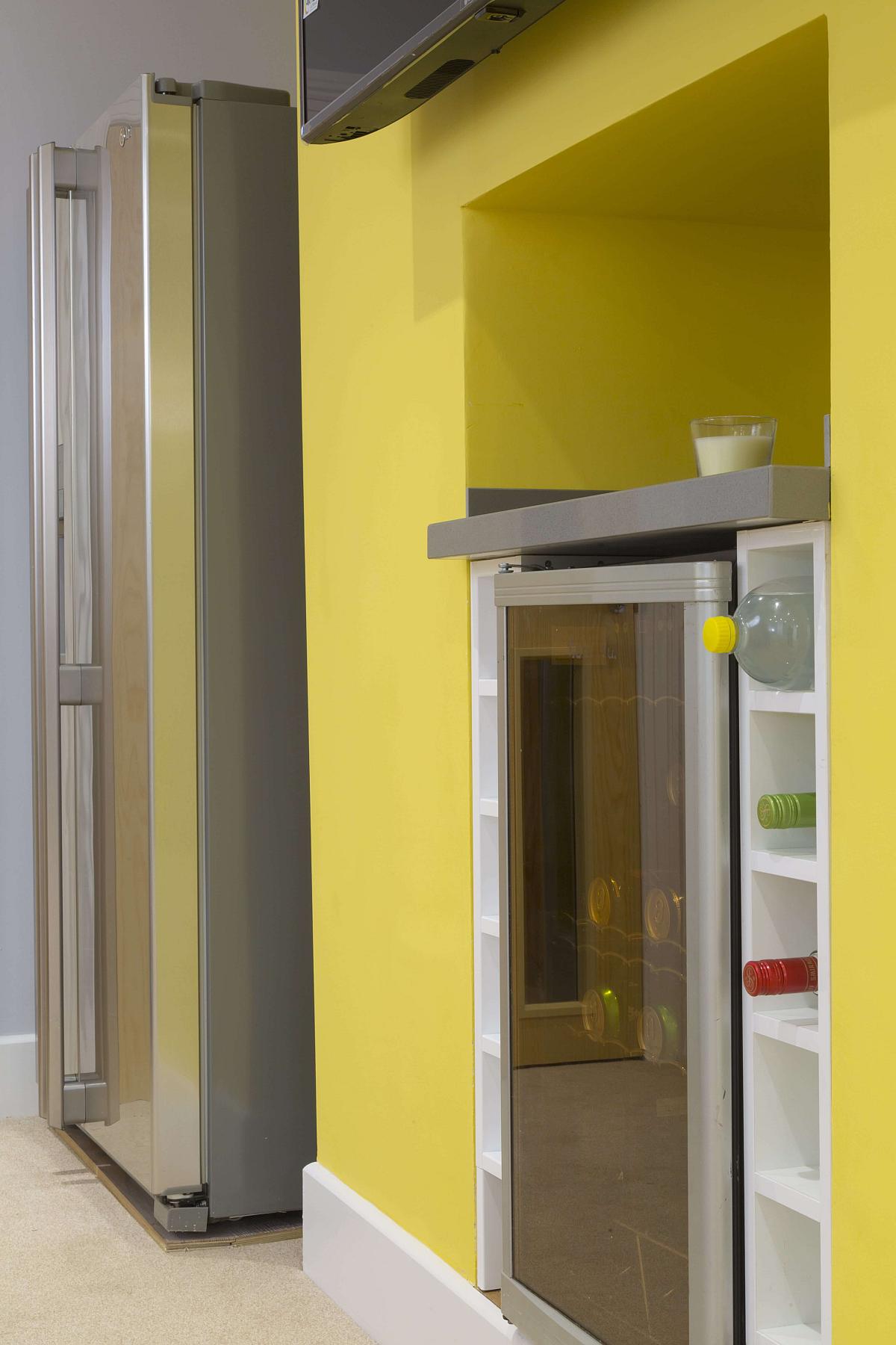 Double door fridge freezer and drinks fridge in shared kitchen and dining area