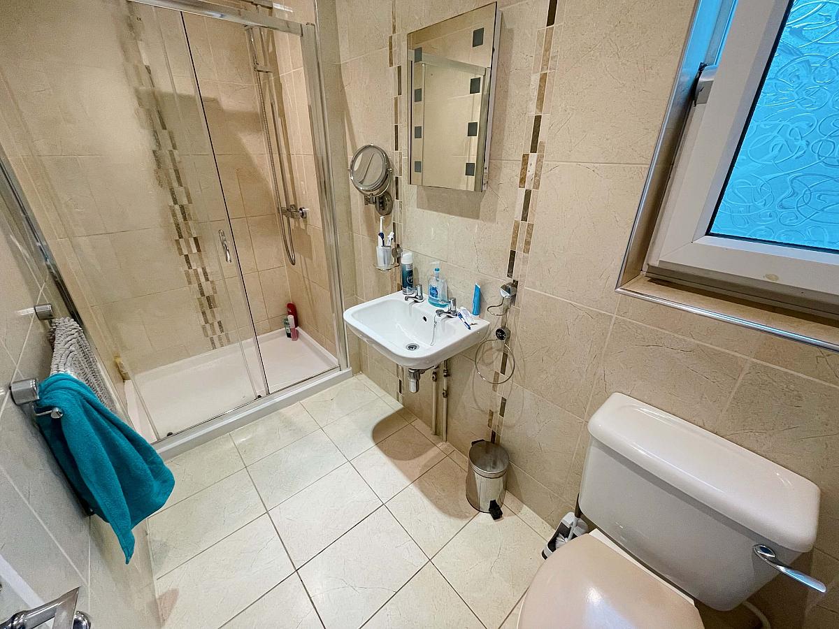 Shared bathroom with shower