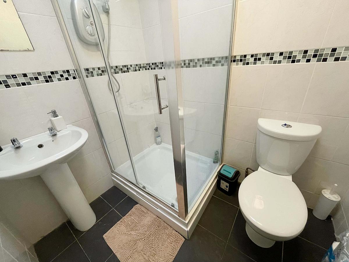 Shared bathroom with shower