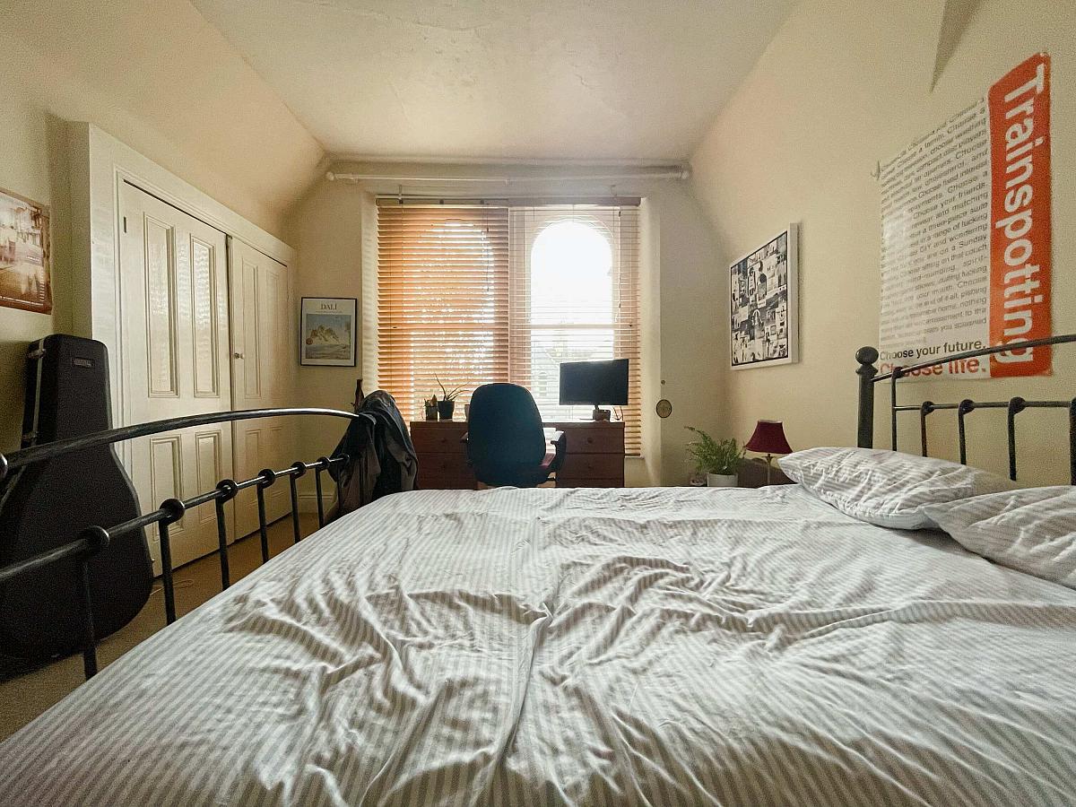 Second student bedroom with desk and built-in wardrobe 