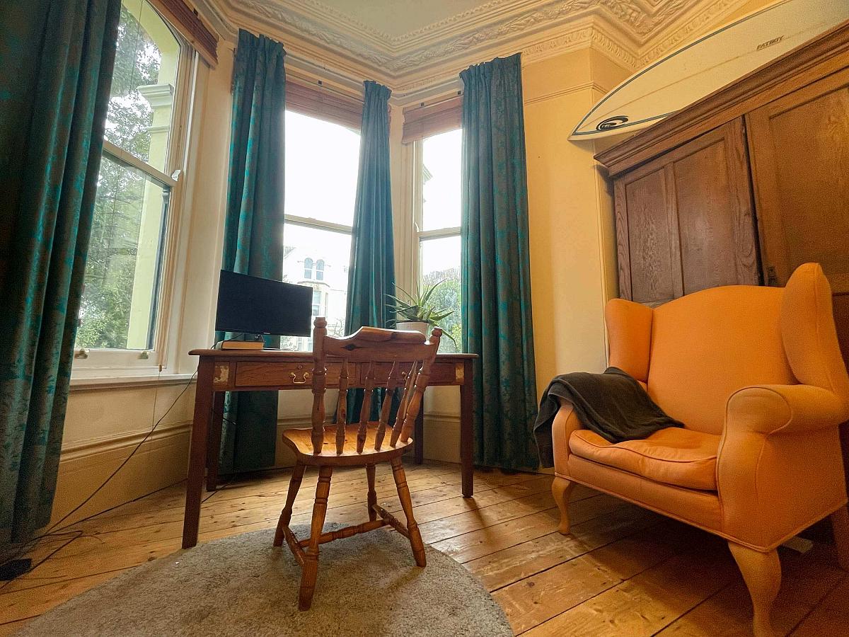 first student room double bed with desk and double wardrobe
