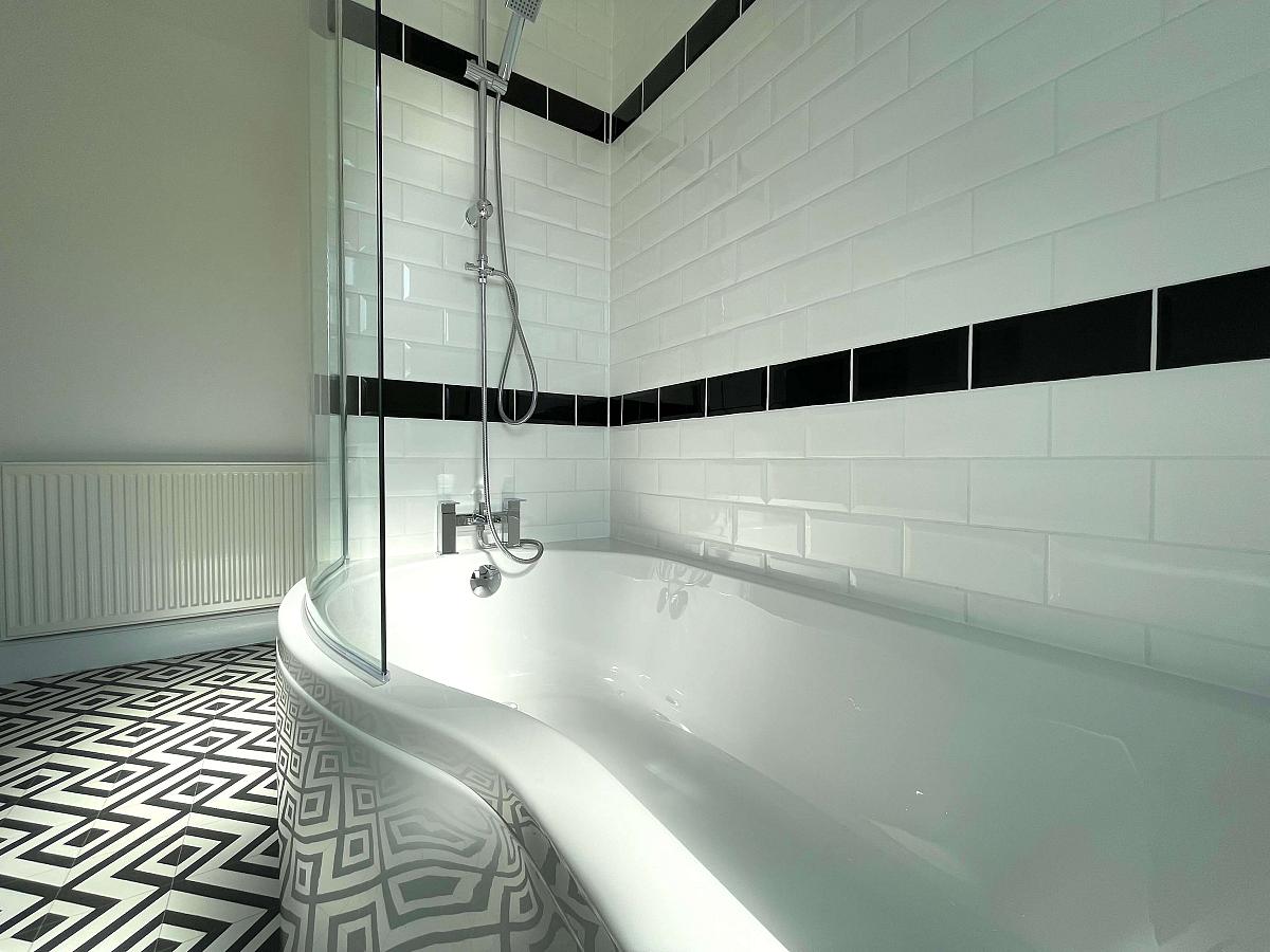 Shared bathroom with large shower