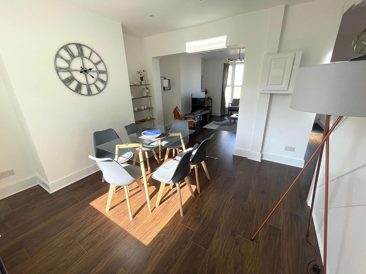 Shared dining area leading to living area