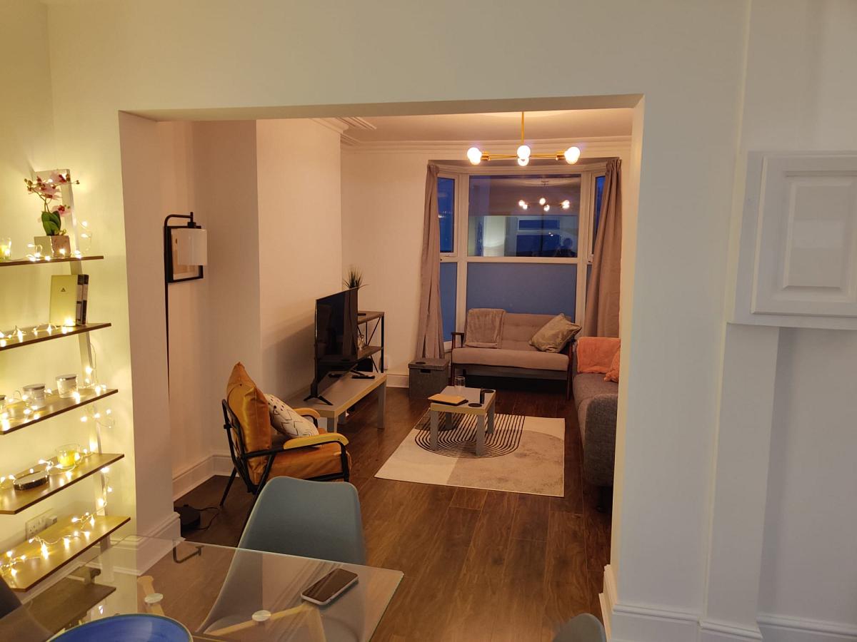 shared living area with two double sofas