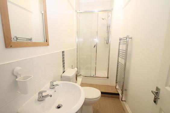 shared bathroom with shower