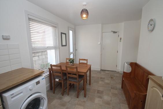 shared kitchen with dining area