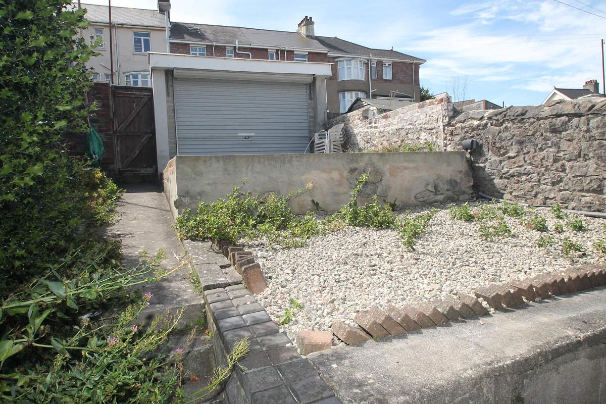 back garden area with stoned area and outside seating 